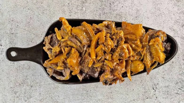 Isi-Ewu - traditional Nigerian goat head delicacy